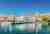 Pastel coloured buildings and stone bridge | Trogir waterfront | Croatia | Riviera Travel | yacht cruise