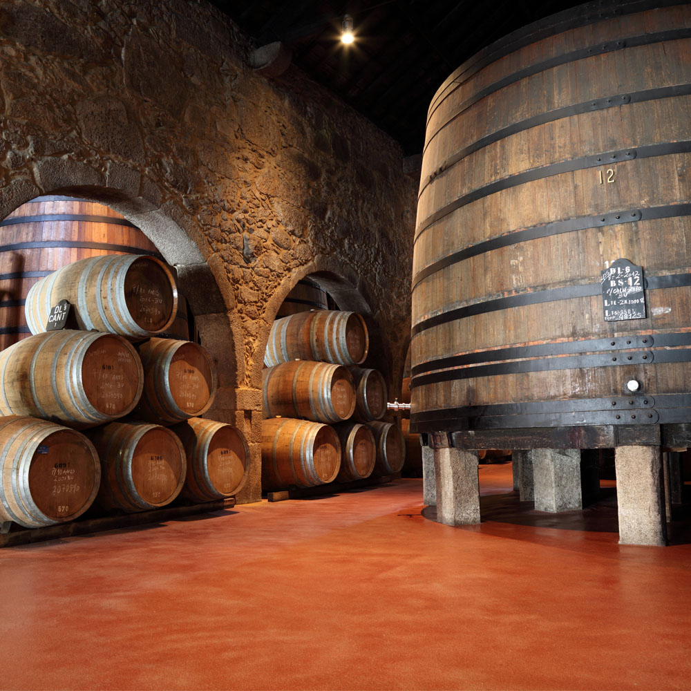 Porto wine cellar with wooden barrels in Porto, Portugal
