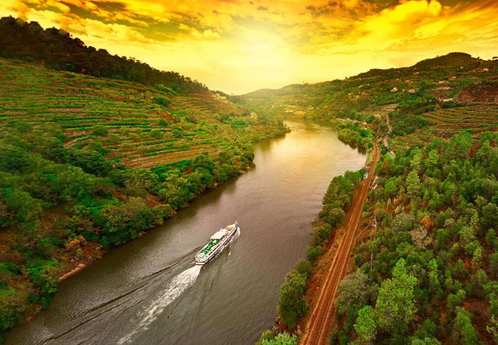 Cruising down the Douro Valley golden sky sunset